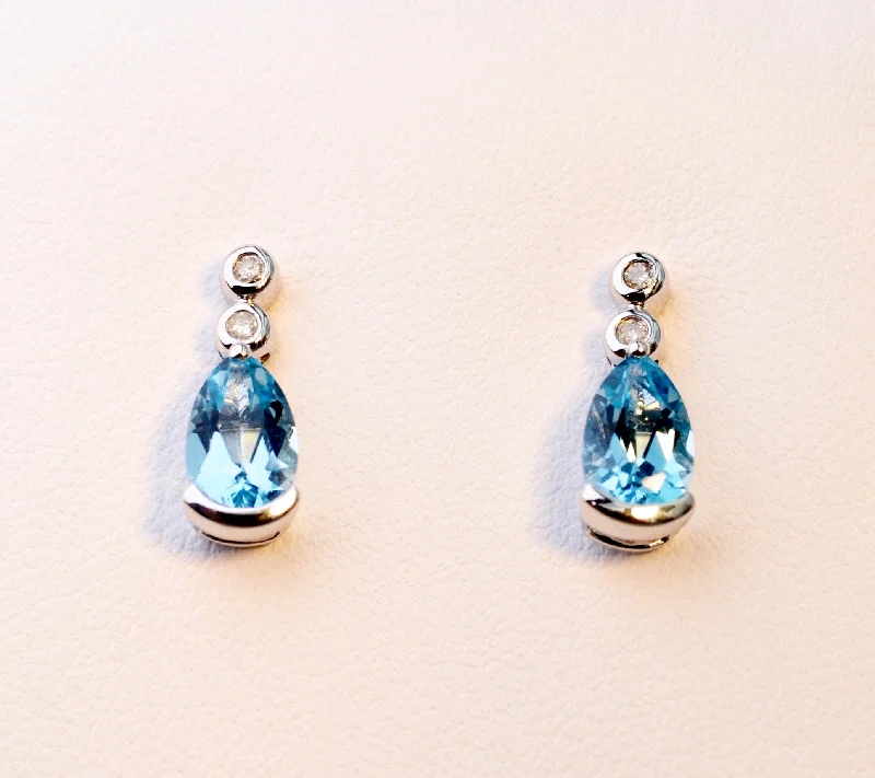 Handcrafted Silver Drop Earrings-14K white gold post earrings with pear-shaped Blue Topaz drops