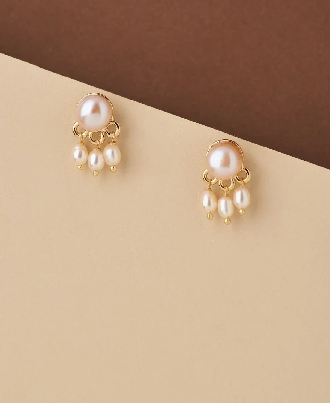 Fashion Earrings for Casual Wear-Standout Golden Pearl Hanging Earring