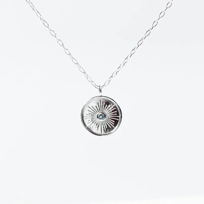 Stylish Necklace for Daily Wear-Rimmed Round Silver Necklace With Blue Topaz